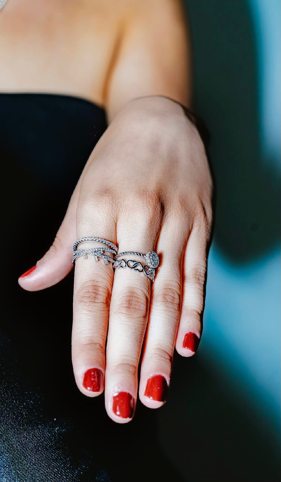 Anillo corazones entrelazados