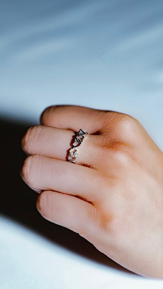 Anillo corazones entrelazados